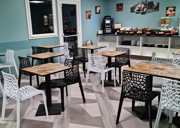 Logis Atrium Golbey Отель